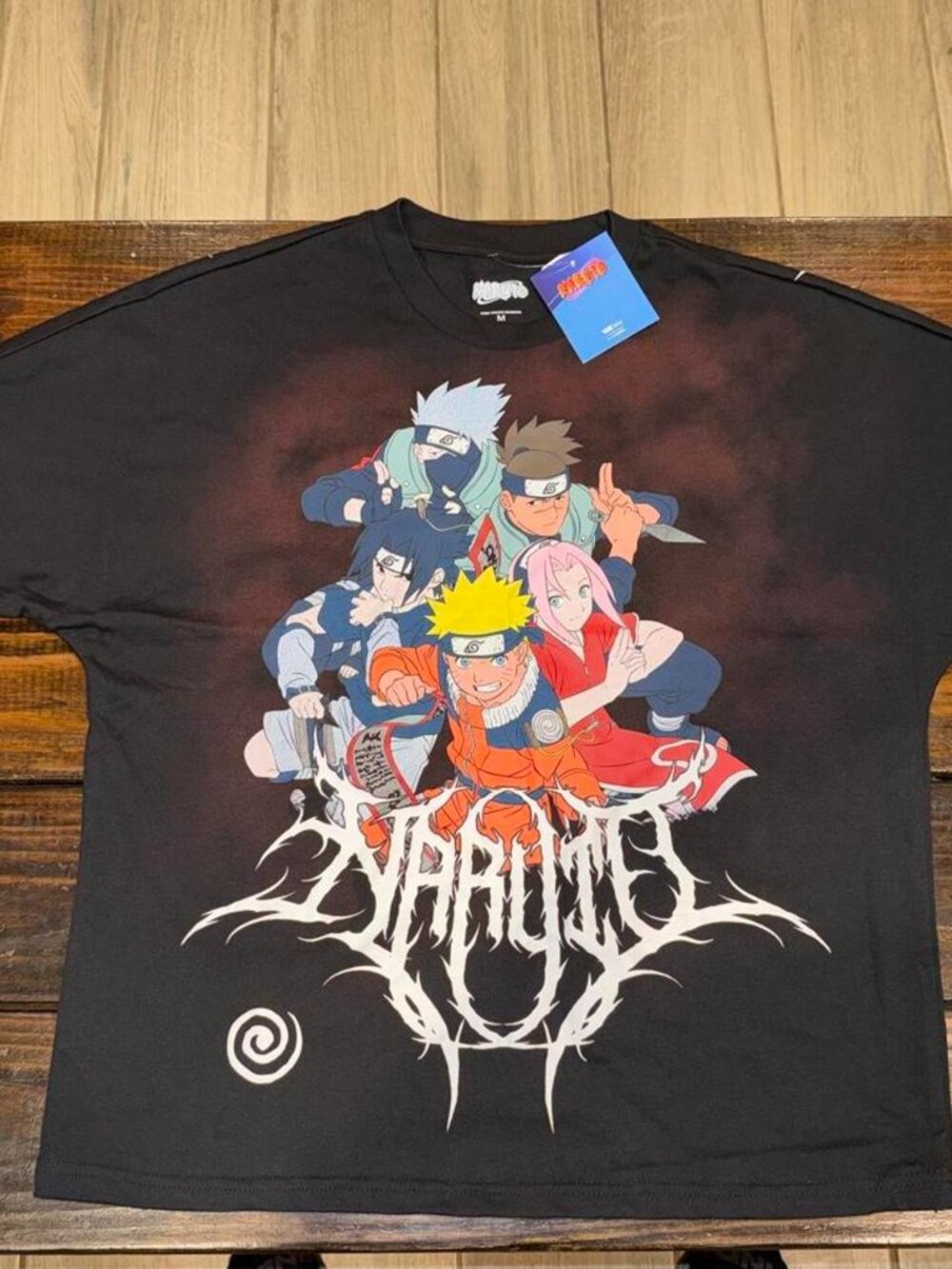 Black Naruto Men’s graphic teen. Brand new with original tags men’s size medium.